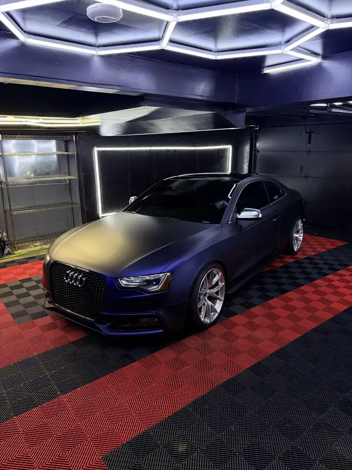 Midnight blue Audi S5 in satin paint protection film